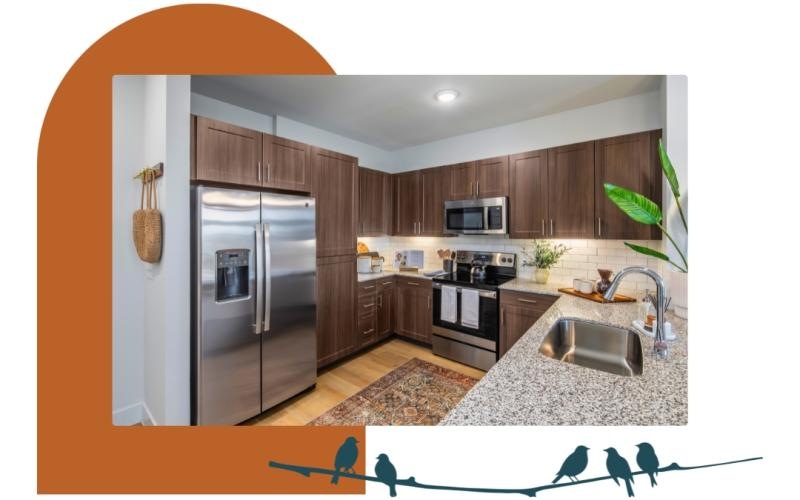 a kitchen with a refrigerator and sink