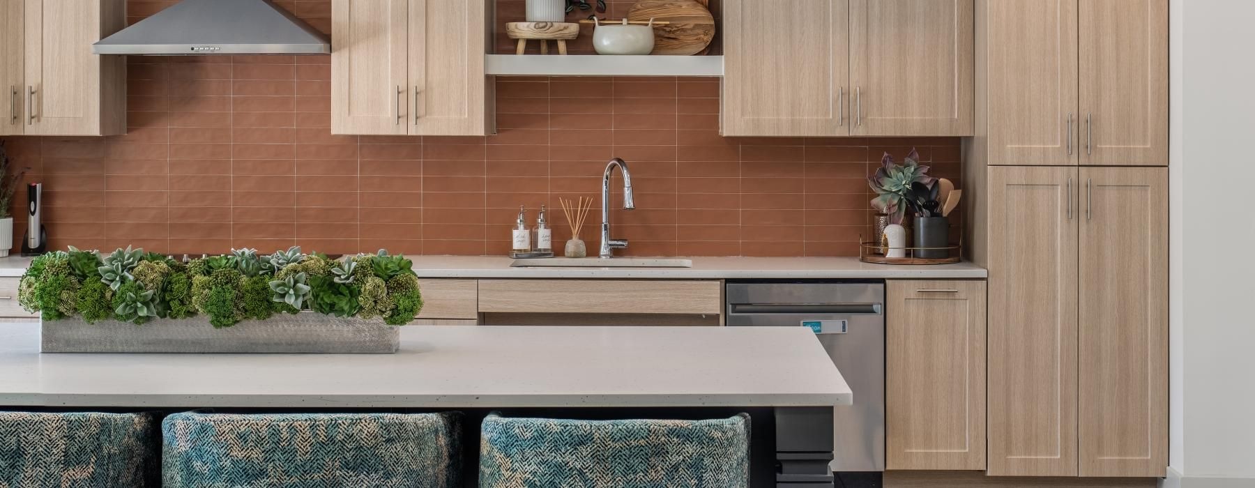 a kitchen with a table and chairs